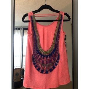 Bright coral tank with detailed and open back